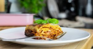 Lasagna on a white plate